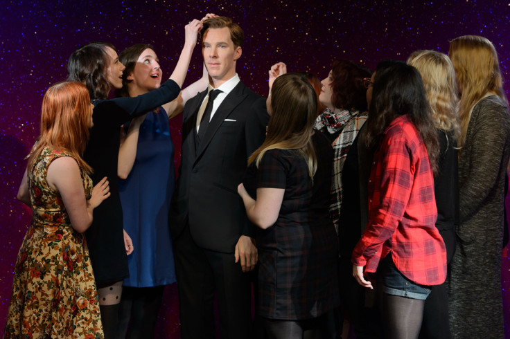 Benedict Cumberbatch fans touch the wax figure's hair reverently