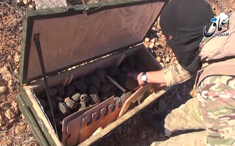 Still picture from pro-Isis video showing airdropped US military aid in the hands of Isis