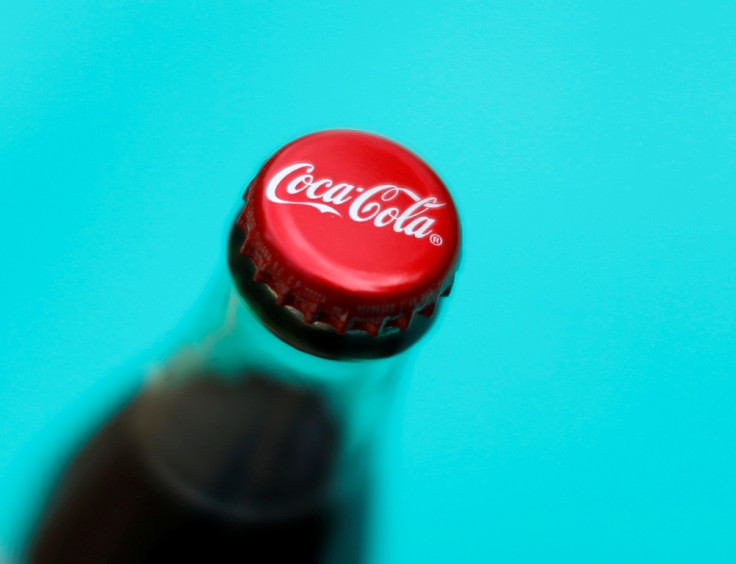 Coke's Profit Falls Prompting Firm to Expand Cost-Cutting Drive