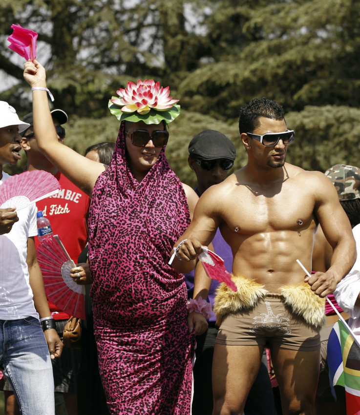 People take part in the Joburg Pride Parade in Johannesburg October 2, 2010