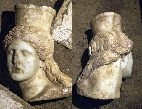 The sphinx head was discovered under some fallen slabs of stone in the fourth chamber. It has long curling hair with traces of red paint
