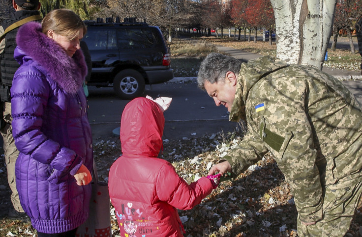 President Petro Poroshenko Votes in Restive Eastern Ukraine Instead of Kiev