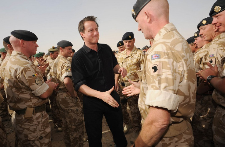 Britain's Prime Minister David Cameron speaks to British forces at Camp Bastion in Helmand Province
