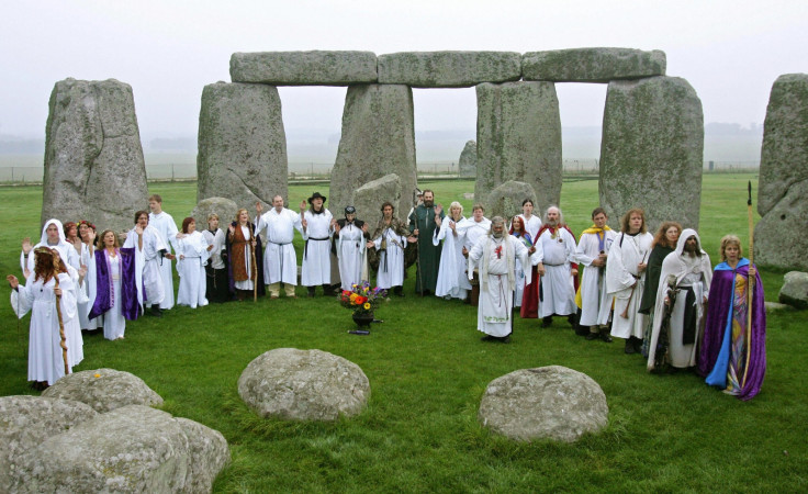 Druids perfoming a pagan Samhain blessing ceremony at Stonehenge during the month of October