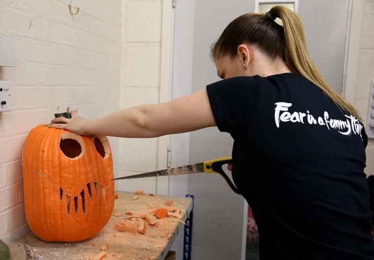 A pumpkin being carved by a London Dungeons employee to decorate the attraction for Halloween