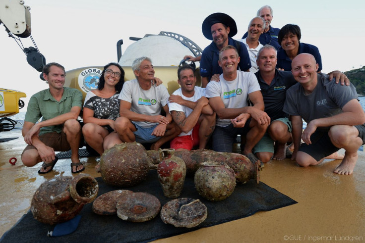 The GUE team together with ancient food storage vessels retrieved from the wreck