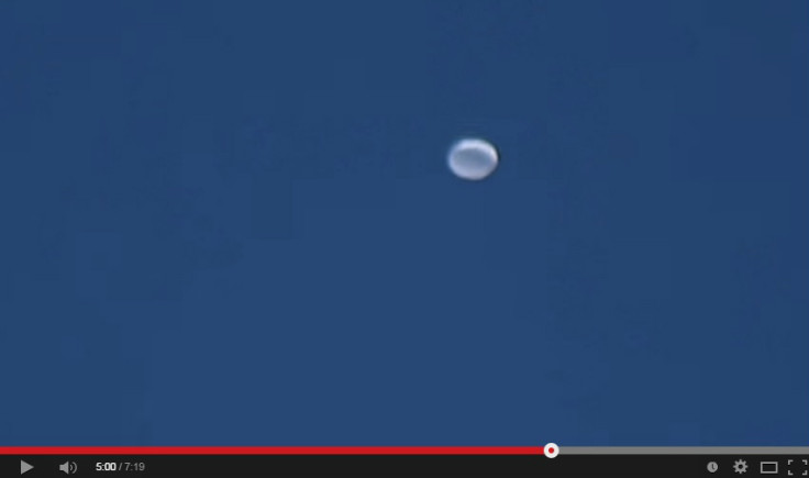 White Disc Shaped UFO Sighted Flying Over Southern Colorado Sky [VIDEO]