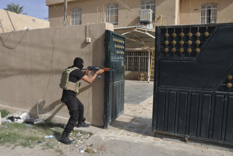 A member of the Iraqi security forces battles Isis militants in Ramadi, al Anbar province (Reuters)
