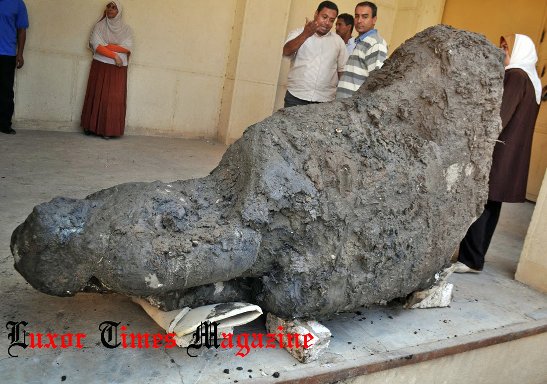 The pink granite statue of a seated figure will now be taken to a site in Saqqara to be restored The pink granite statue of a seated figure will now be taken to a site in Saqqara to be restored