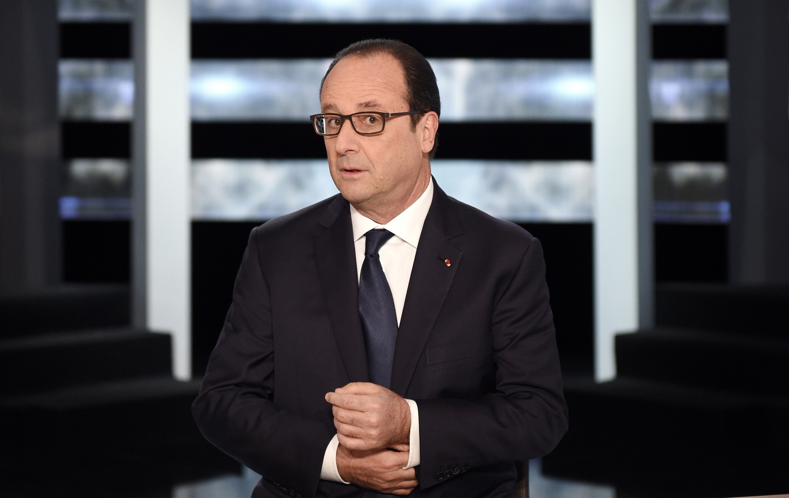 Frances President Francois Hollande poses before appearing on TF1 television prime time news live broadcast at their studios in Aubervilliers, near Paris, November 6, 2014
