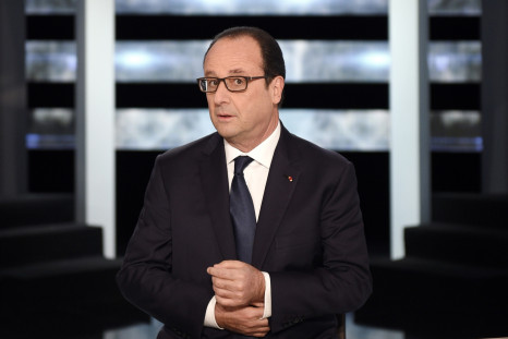 France's President Francois Hollande poses before appearing on TF1 television prime time news live broadcast at their studios in Aubervilliers, near Paris, November 6, 2014
