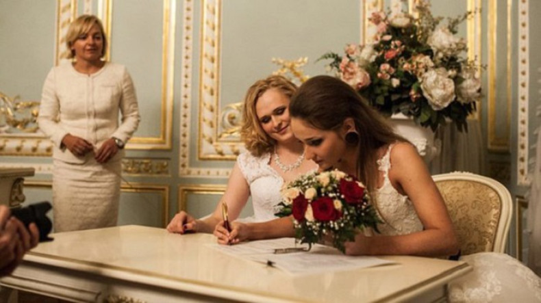 Irina Shumilova and Alyona Fursova were allowed to marry despite Russia's ban on gay marriage because according to their passports one is a man and the other is a woman
