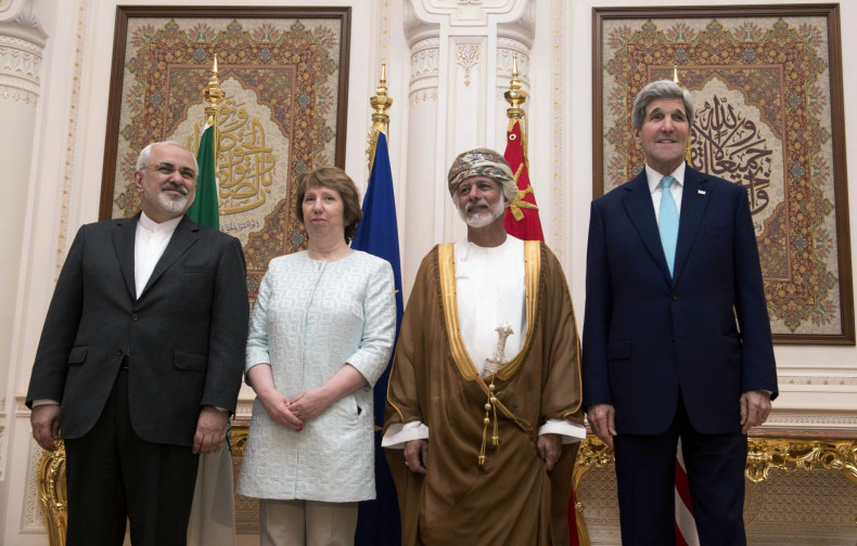(L-R) Iranian Foreign Minister Javad Zarif, EU envoy Catherine Ashton, Omani Foreign Minister Yussef bin Alawi and U.S. Secretary of State John Kerry pose for a photo in Muscat