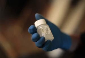 Orange County Deputy Probation Officer Erin Merritt holds a canister of methadone Orange County Deputy Probation Officer Erin Merritt holds a canister of methadone