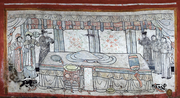 A bedroom scene depicted in a Chinese tomb from the Liao Dynasty period. It was traditional for the tomb occupant not to be featured.