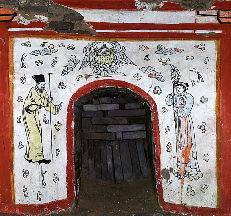 A mural painted at the tomb's entrance, featuring an old man and a women who are probably gods, and a garuda (mythical bird) on some A mural painted at the tomb's entrance, featuring an old man and a women who are probably gods, and a garuda (mythical bird) on some