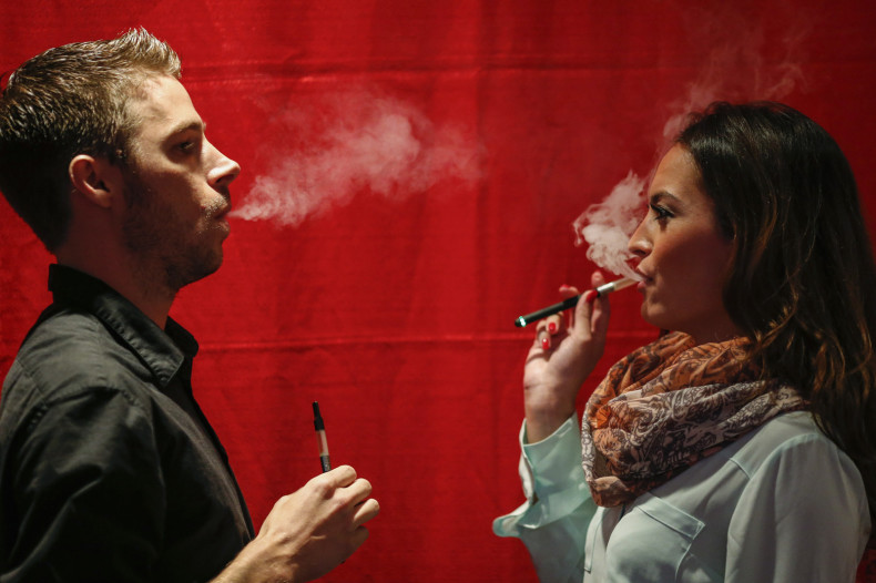 Smoking e-cigarette with cannabis liquid