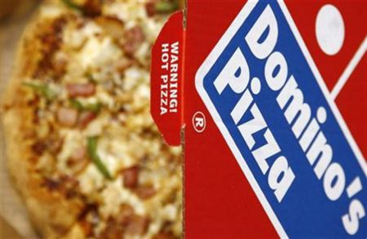 A Domino's Pizza is pictured in its box in central London