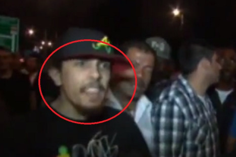 Australian media broadcasts footage it claims is 'Jihadi John' suspect Abdel-Majed Abdel Bary (circled)