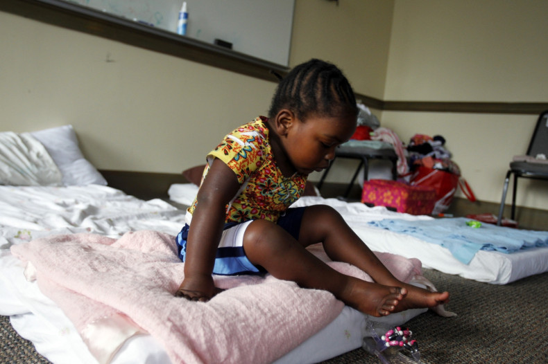 Two-year-old girl at the Covenant Presbyterian Church temporary shelter in Charlotte, North Carolina