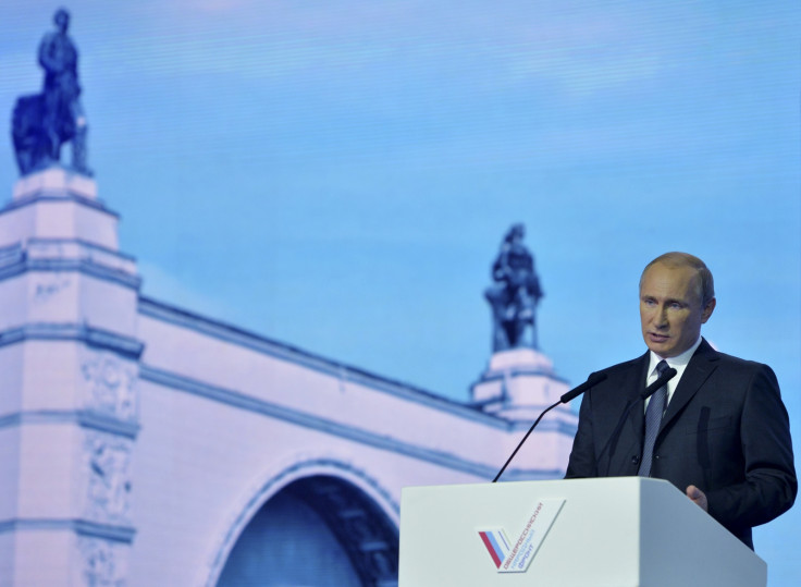 Putin delivers his speech in Moscow today at a meeting of the All-Russia People's Front (Reuters)