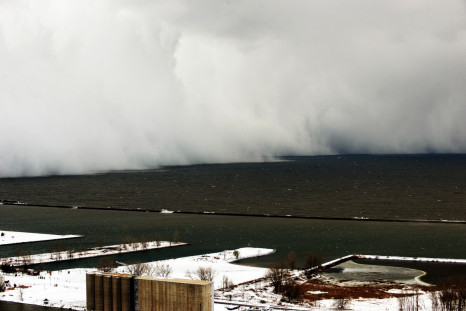 A lake-effect snow storm with freezing temperatures produces a wall of snow travelling over Lake Erie into Buffalo, New York. November 18, 2014. A whirlpool of frigid, dense air known as a "polar vortex" descended Tuesday into much of the Northeastern U