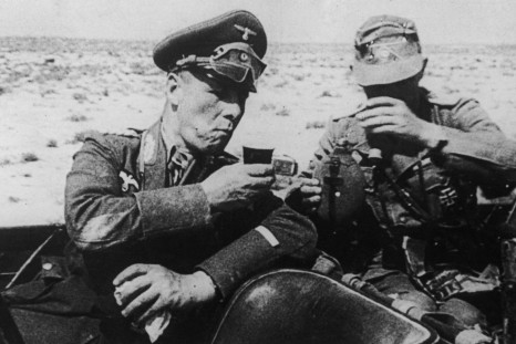 German field marshal Erwin Rommel takes refreshment  in the Lybian desert during the 1941 campaign