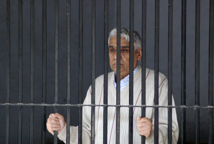 Satguru Rampalji Maharaj in police custody, after being arrested in relation with a 2006 murder case. (Reuters)