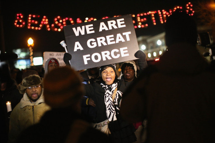 Protesters gather in Ferguson ahead of the Darren Wilson verdict (Getty)