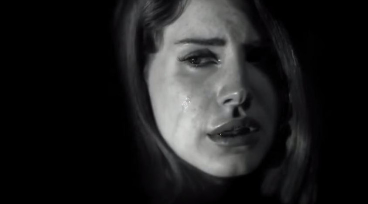 Still from graphic video depicting singer Lana Del Rey in a harrowing rape scene