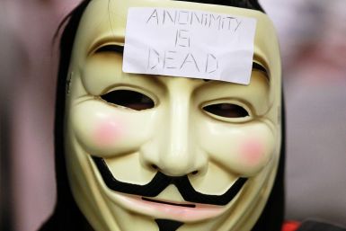 Anonymous protester. The group nhas published the personal details who they claimed ignored information on the innocence of a teen accused of 'swatting'. (Getty)