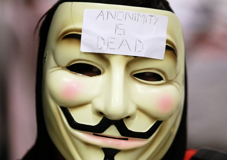 Anonymous protester. The group nhas published the personal details who they claimed ignored information on the innocence of a teen accused of 'swatting'. (Getty)