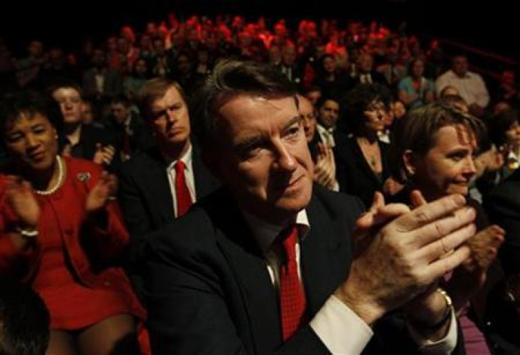 File image shows Business Secretary Mandelson applauding at a Labour Party rally in Manchester