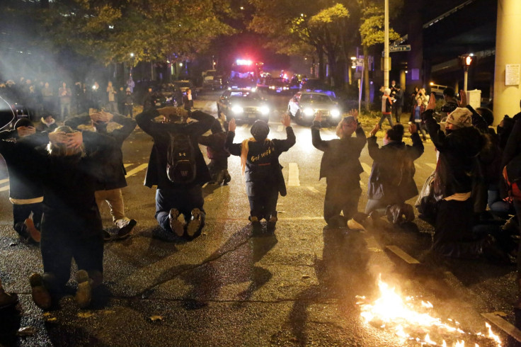 Ferguson: Violence Erupts After No Charges Filed Against Wilson