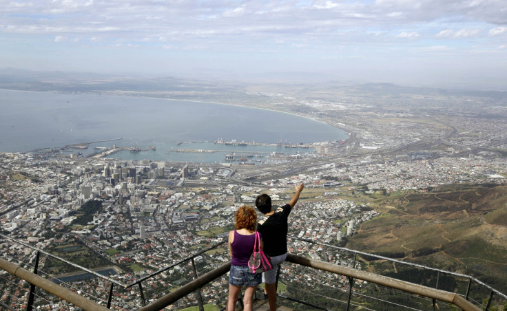 Visitors enjoy the view over the city of Cape Town from the top of Table Mountain