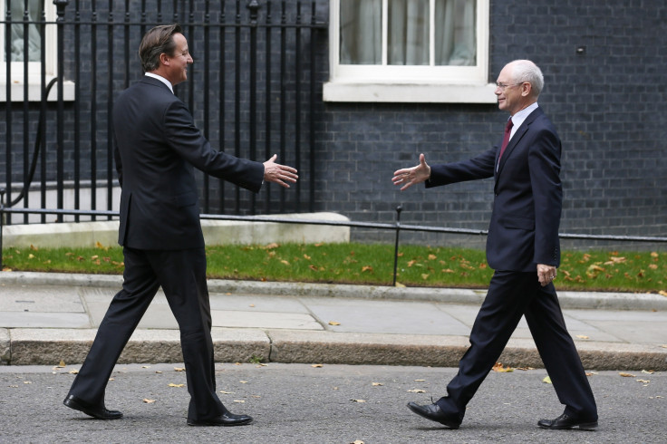 Britain's Prime Minister David Cameron (L) greets the President of the European Council, Herman Van Rompuy, outside 10 Downing Street in central London October 8, 2013