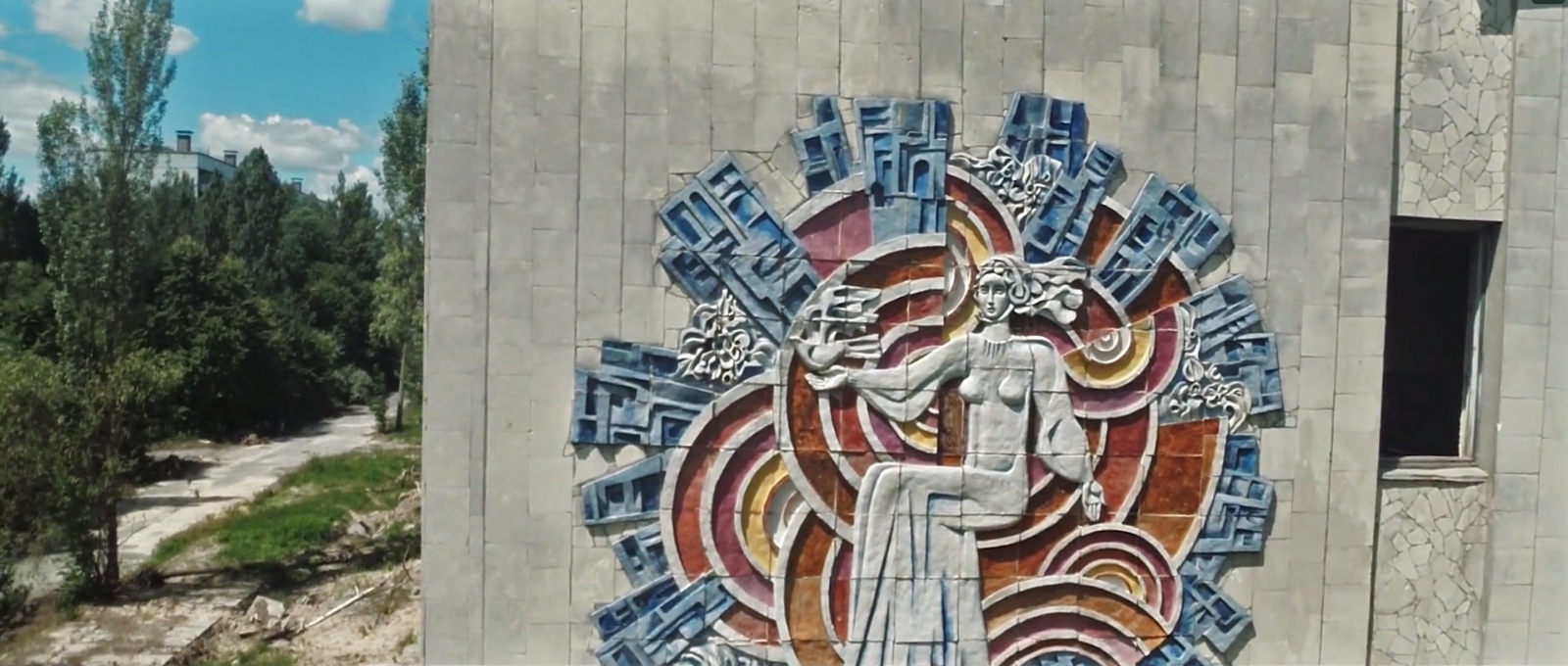 A mural painted into the side of a building in Pripyat A mural painted into the side of a building in Pripyat