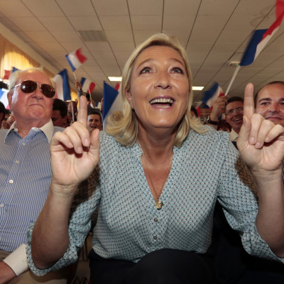 Marine Le Pen, France's National Front political party leader (C)