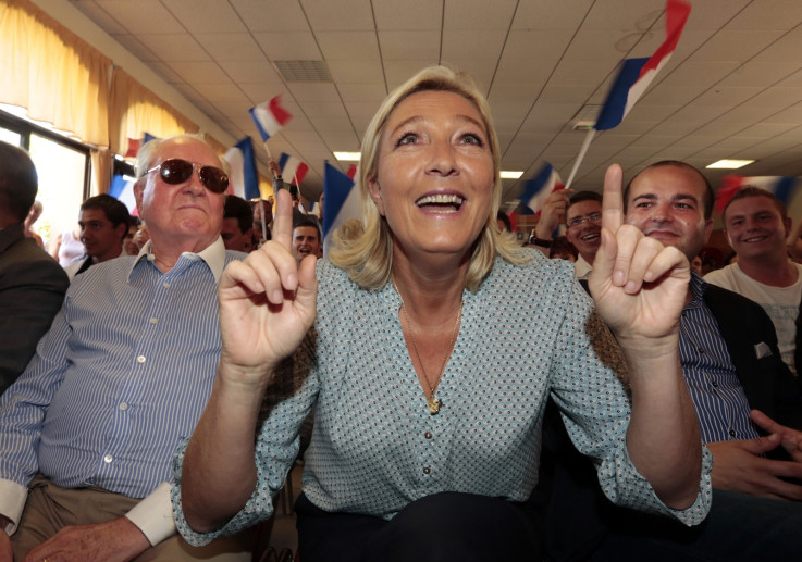 Marine Le Pen, France's National Front political party leader (C)