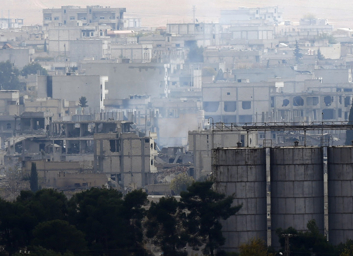 Smoke rises from central Kobani during fighting between Islamic State militants and Kurdish forces Smoke rises from central Kobani during fighting between Islamic State militants and Kurdish forces
