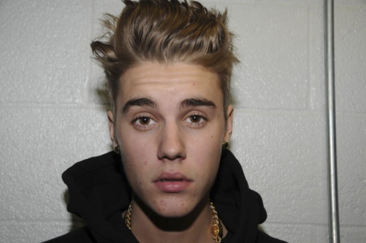 Canadian pop singer Justin Bieber is pictured in police custody in Miami Beach, Florida Canadian pop singer Justin Bieber is pictured in police custody in Miami Beach, Florida