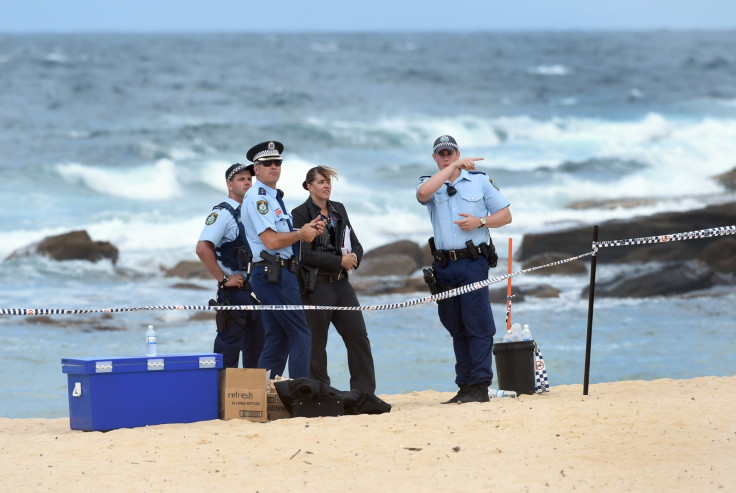 Police examine the place where two boys found the body of a dead baby in Maroubra Beach, Sydney. (WILLIAM WEST/AFP/Getty Images)
