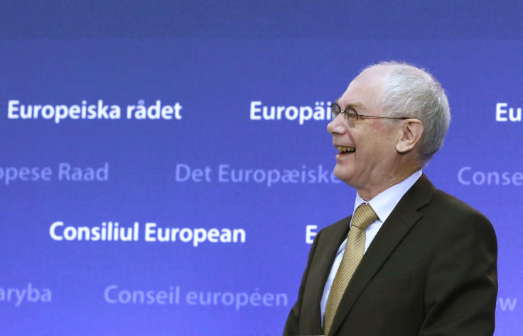 Outgoing European Council President Herman Van Rompuy smiles during a ceremony with former Polish Prime Minister, Donald Tusk (not in picture), during which Tusk took over from Van Rompuy replacing him as head of the European Council, in Brussels, Decembe