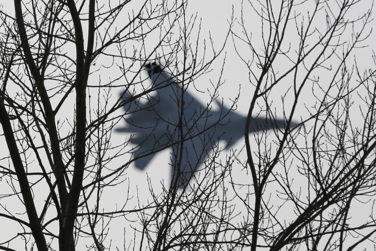 A jet fighter from the Su-30 SM "Sokoly Rossii" (Falcons of Russia) aerobatic team performs during a show in Krasnoyarsk, Siberia, October 25, 2014. The show is conducted as part of a recruitment drive for Russia's military divisions, targeting the you