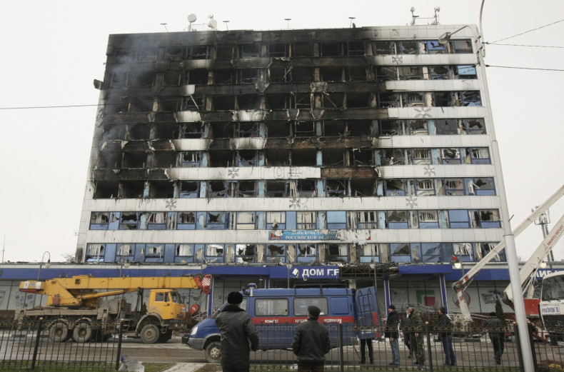 The burnt exterior of the Press House, a local media agency, is seen in the Chechen capital Grozny