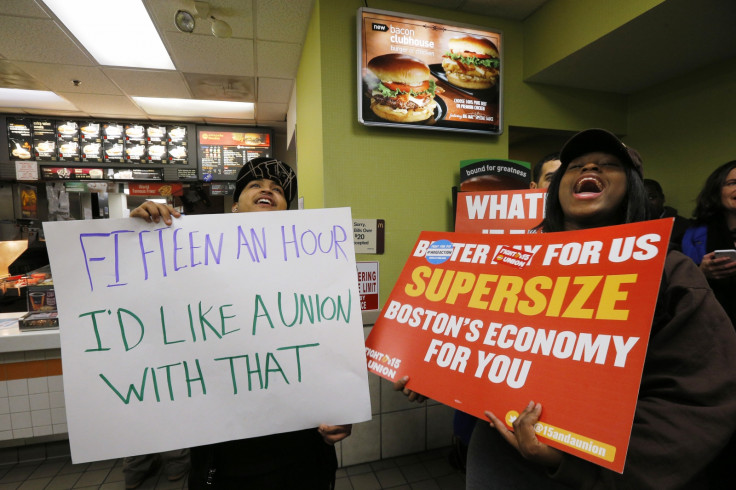 Scores of fast food workers and their supporters calling for a $15 minimum wage fill a McDonalds restaurant in Chelsea, Massachusetts December 4, 2014.