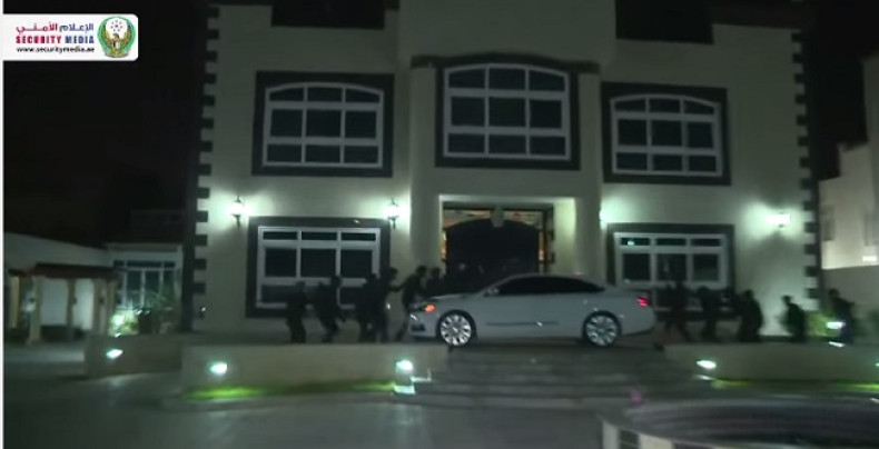 Police released footage of the SWAT team swooping on a home in a night raid