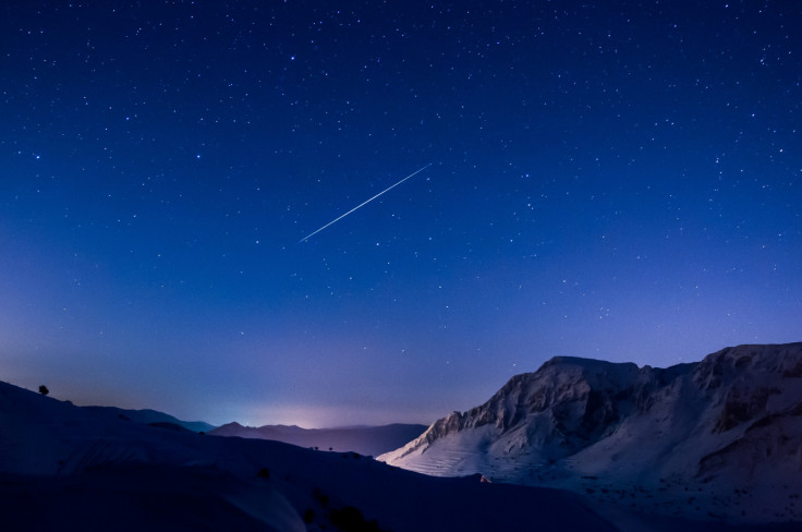 A single shooting star captured during the Geminids meteor shower in 2012