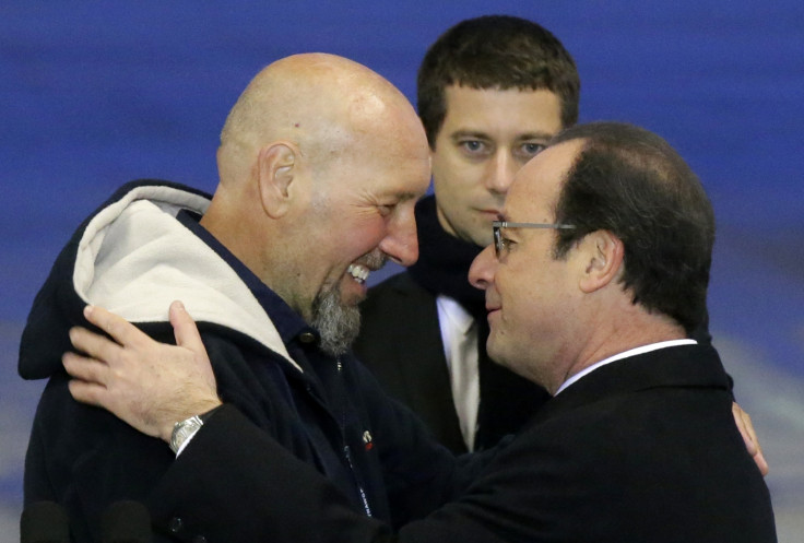 French President Francois Hollande  hostage Serge Lazarevic Villacoublay airport Paris.
