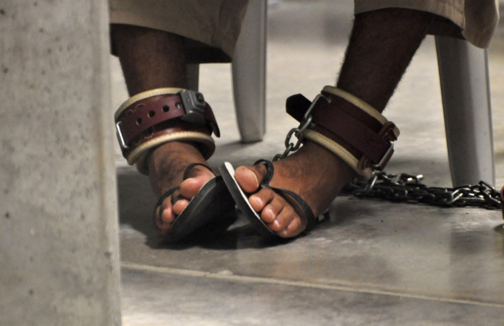 In this photo, reviewed by a U.S. Department of Defense official, a Guantanamo detainee's feet are shackled to the floor as he attends a In this photo, reviewed by a U.S. Department of Defense official, a Guantanamo detainee's feet are shackled to the floor as he attends a